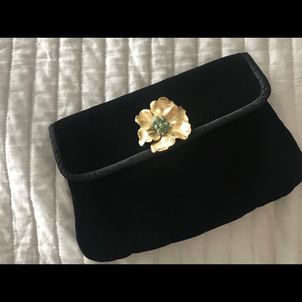 Black velvet clutch with vintage brooch